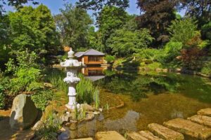 Pond with tea house at the Japanese garden Kaiserslautern