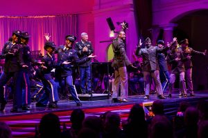 U.S. Army Europe and Africa (USAREUR-AF) Band and Chorus performing on stage